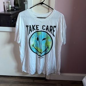 White T-shirt that has earth on it